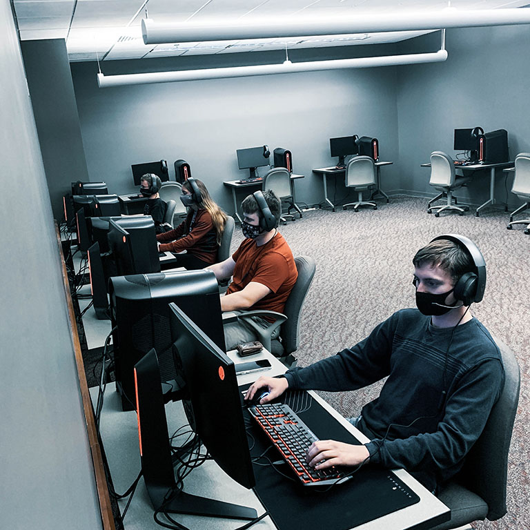 IU East esports team seated at gaming computers in computer lab