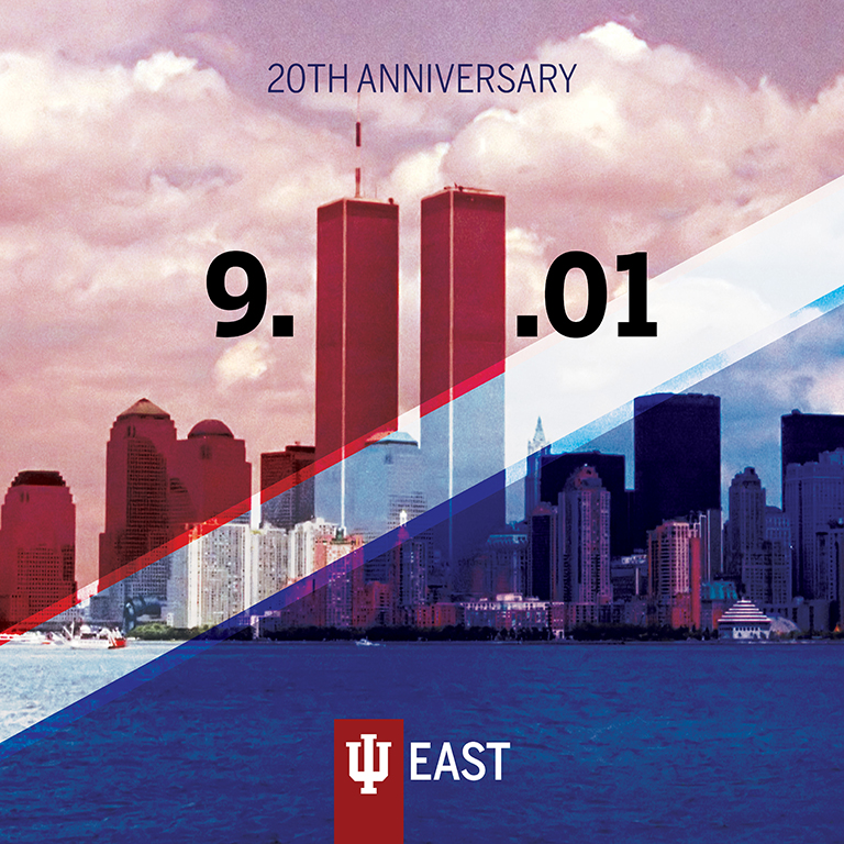 Graphic depicting the World Trade Center Towers with red, white and blue accents