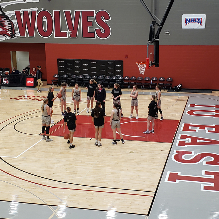 IU East and West Virginia University Tech women's basketball teams shooting free throws for charity in IU East gymnasium