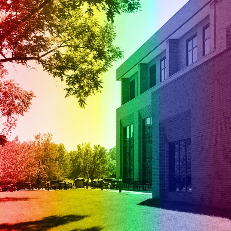 Exterior of IU East campus building, Tom Raper Hall, depicted with a rainbow image filter