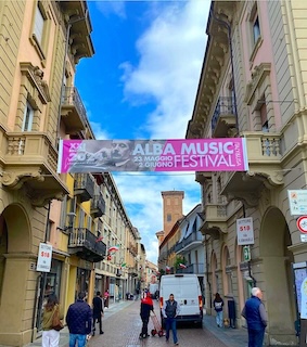 The Alba Music Festival banner hanging above the street in Alba, Italy.