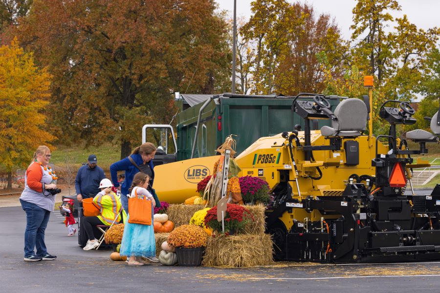 Families enjoying touch a truck at the IUS Fest in 2023
