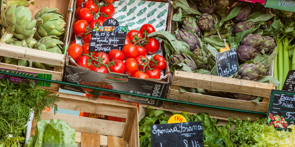 Boxes of fruits and vegetables at farmers market