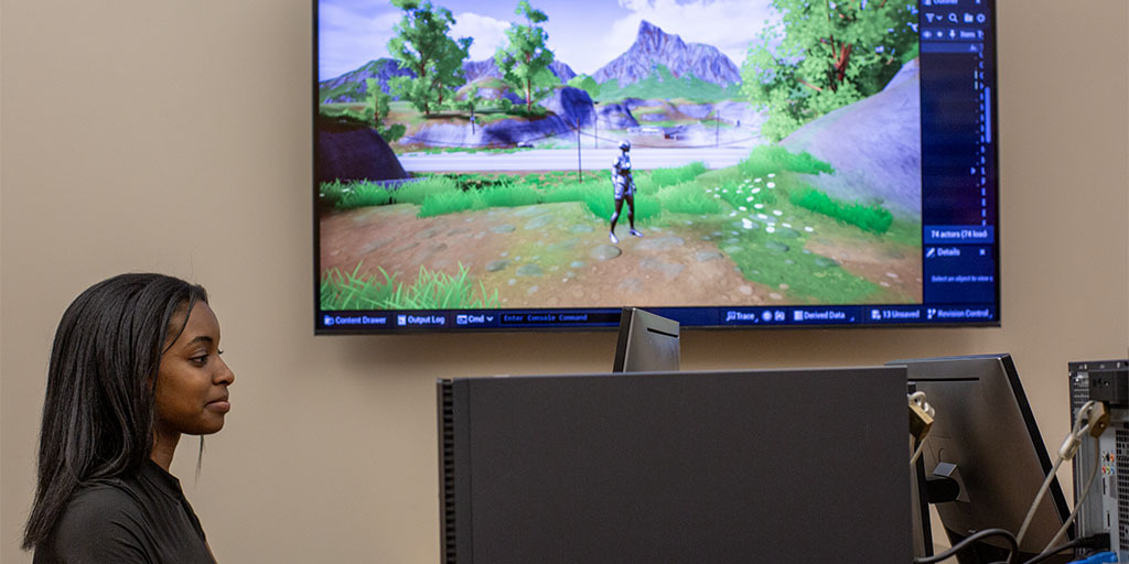 MAS student Imani Peters works on Mystery of Vee Island game