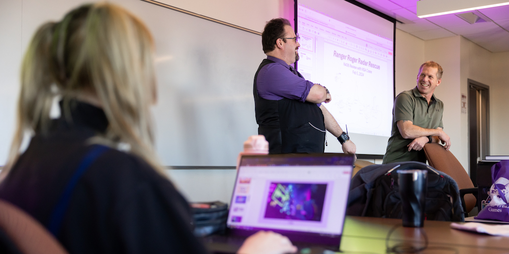Mathew Powers (purple shirt), Lecturer with the Luddy School of Informatics, Computing, and Engineering, along with Todd Shelton (green s...