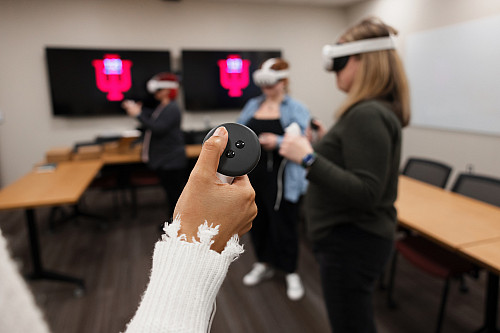 Staff from the Richard M. Fairbanks School of Public Health wore VR headsets to demonstrate how they train healthcare workers on infectio...