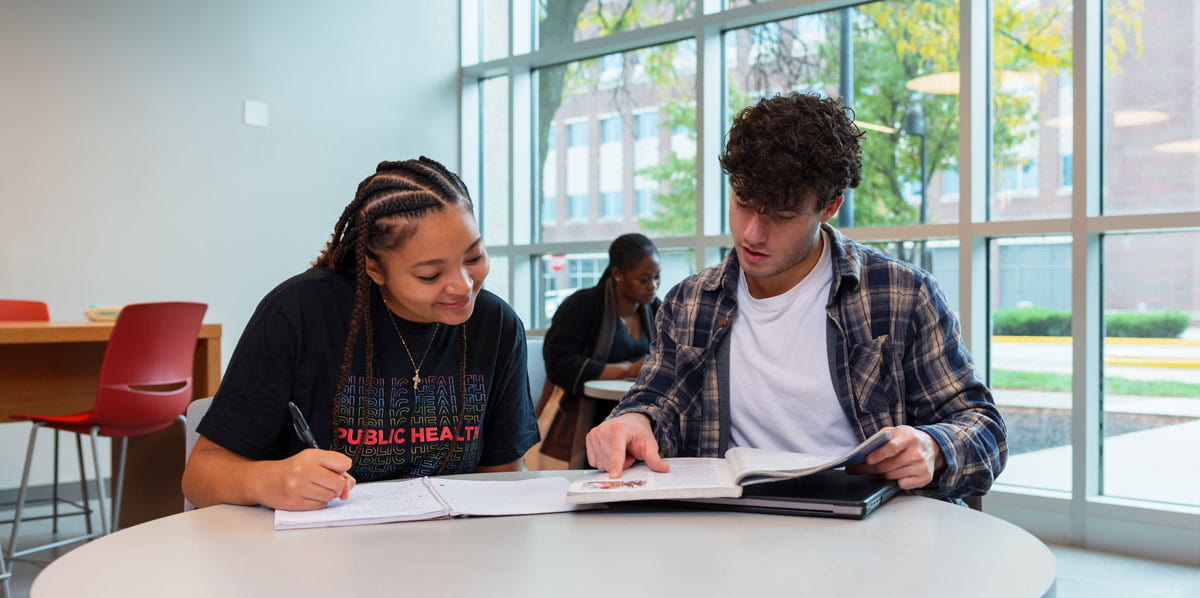 two students studying together