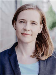Prof. Dr. Juliane Degner: a woman with light hair wearing a blazer over a light blue top.