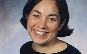 A photo of Jill Behrman smiling.