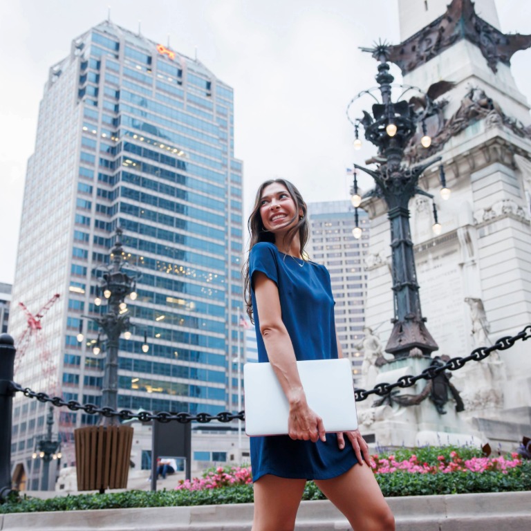A woman walking around downtown Indianapolis