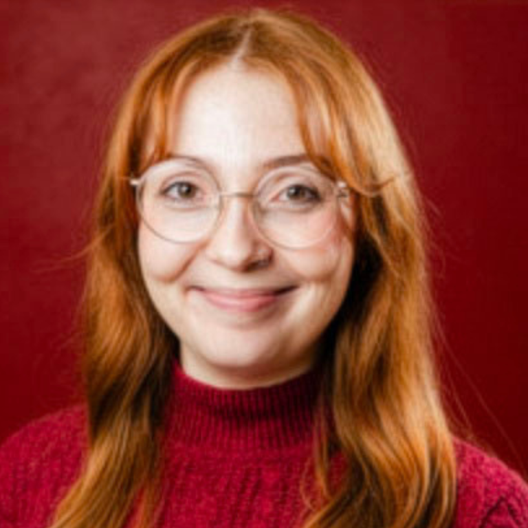 A headshot of Jenna Chase, confidential survivor advocate for CAPS