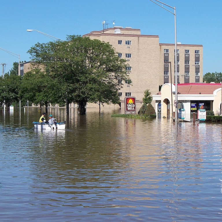 Munster, IN, September 13, 2008 - These residents are boating down a street in Indiana as a result of flooding caused by severe storms wh...