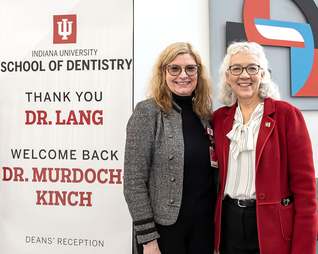 Dr. Lang and Dr. Murdoch-Kinch at a reception on Feb 12. 