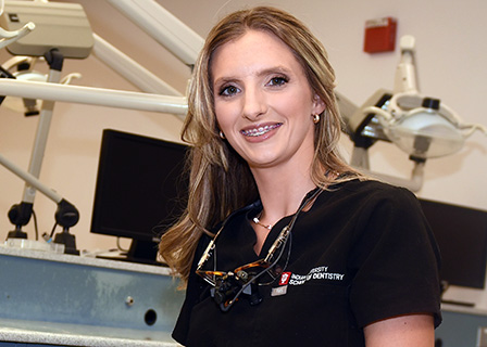 Hygiene student Khris Hahn in clinic