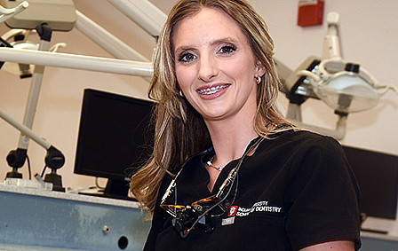 Hygiene student Khris Hahn in clinic
