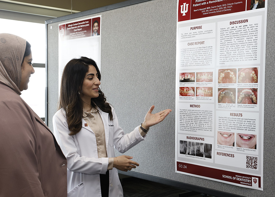 Students participate in the poster session at IUSD Research Day.